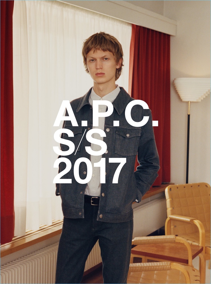 Jonas Glöer wears an A.P.C. grey denim John jacket $320, an Andy polo shirt $125, and regular-fit denim jeans $195.