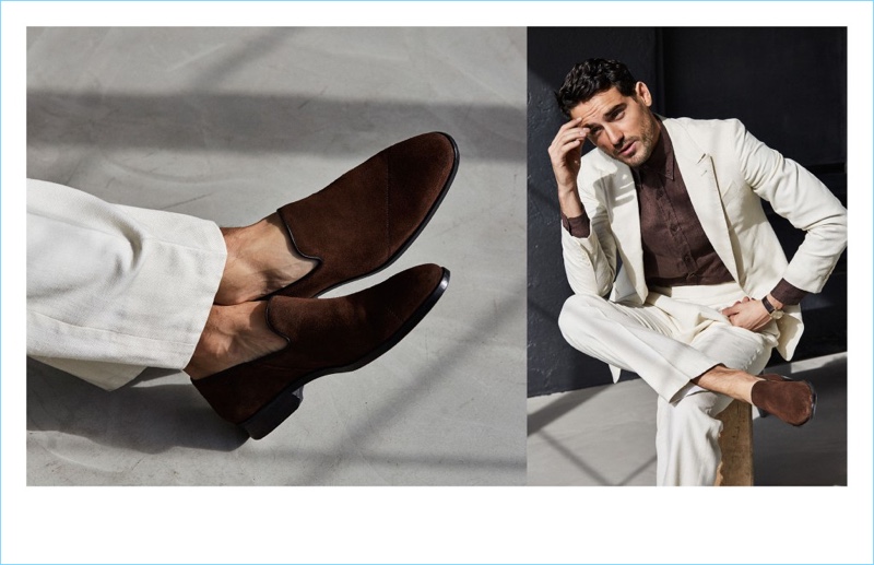 A sleek vision in a white suit, Arthur Kulkov models Between Rivers' slip-on in chocolate suede.