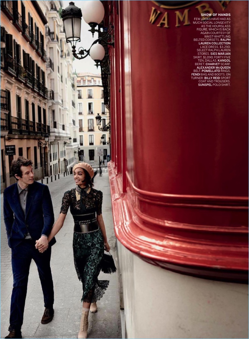 Exploring the streets of Madrid with Ellen Rosa, Callum Turner wears a Billy Reid sport coat and trousers with a Sunspel polo.