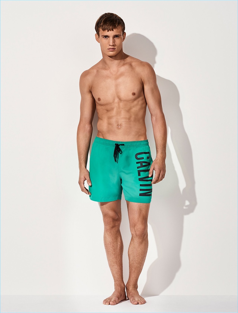 Making a green statement, Julian Schneyder wears Calvin Klein Intense Power medium length drawstring swim shorts $60.