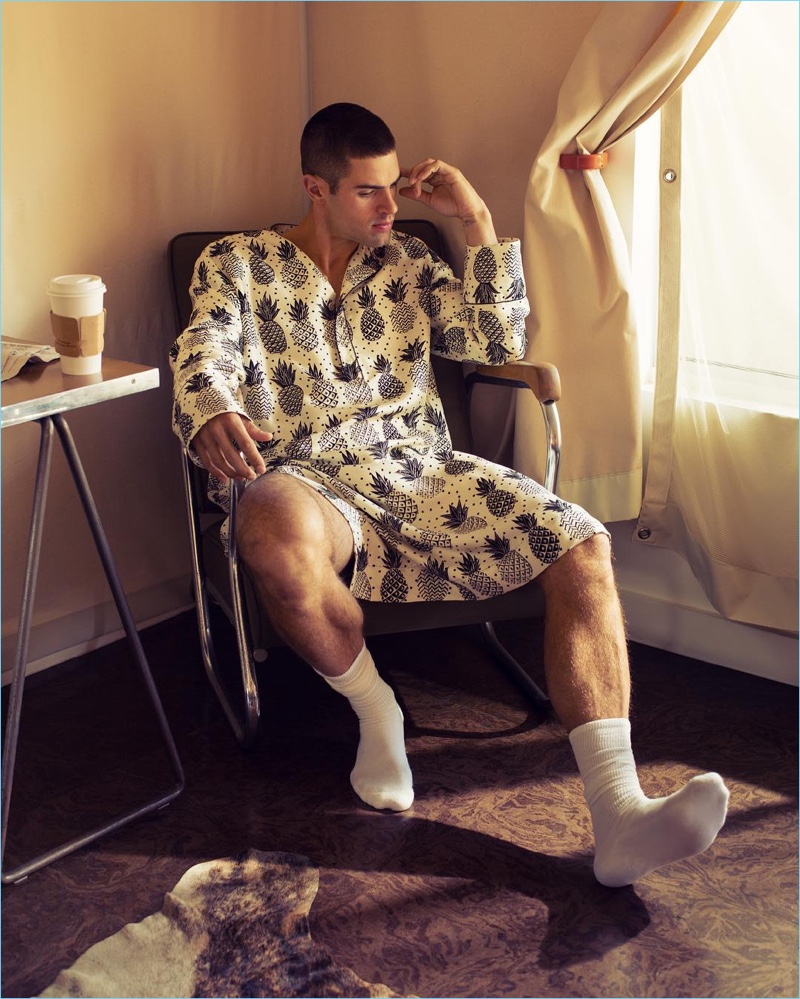 Lounging indoors, Chad White wears a Dolce & Gabbana tunic with American Apparel socks.