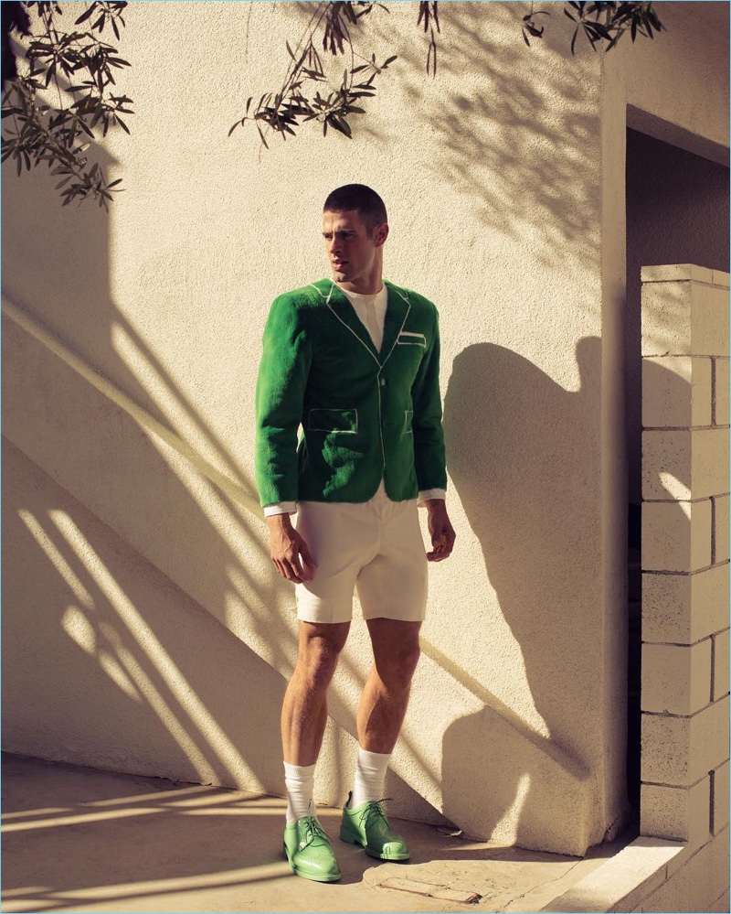 Making a quirky style statement, Chad White wears a faux suiting look from Thom Browne.