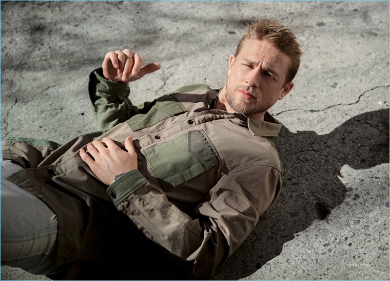 Starring in a photo shoot for Da Man, Charlie Hunnam wears a 3.1 Phillip Lim LS mixed canvas patchwork shirt $450.