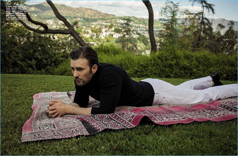 Actor Chris Evans wears a Paul Stuart sweater with Levi's white denim jeans and Officine Generale shoes. » Chris Evans Covers L'Uomo Vogue, Talks 'Gifted' Actor Chris Evans wears a Paul Stuart sweater with Levi's white denim jeans and Officine Generale shoes.