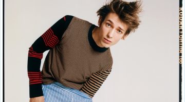 Stripes on Stripes: Christopher Einla for T Magazine Jason Rider outfits Christopher Einla in a Golden Goose Deluxe brand striped t-shirt, McQ Alexander McQueen tee, and Comme des Garçons Shirt shorts.