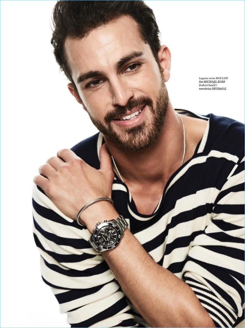 All smiles, Clint Mauro wears sweater for Men's Health Croatia.