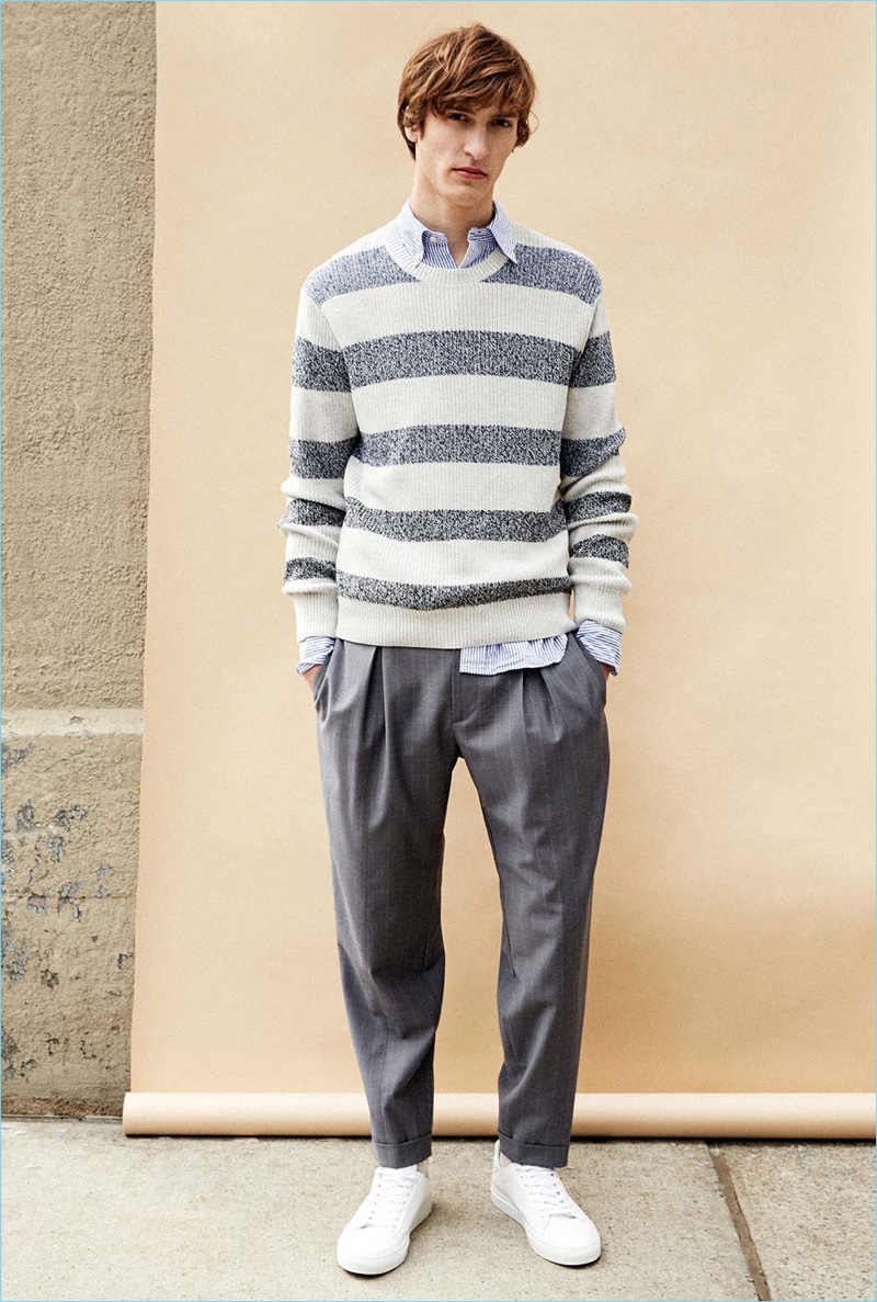 Front and center, Tim Dibble wears a Club Monaco marled stripe sweater $159.50, blue Gitman seersucker shirt $170, pinstripe pleated dress trousers $139, and Wings + Horns Court low-top sneakers $395.