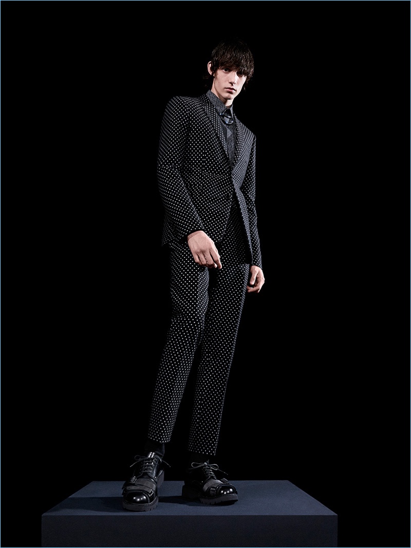 Dior Homme serves up a polka dot dressed suit for its fall-winter 2017 collection.