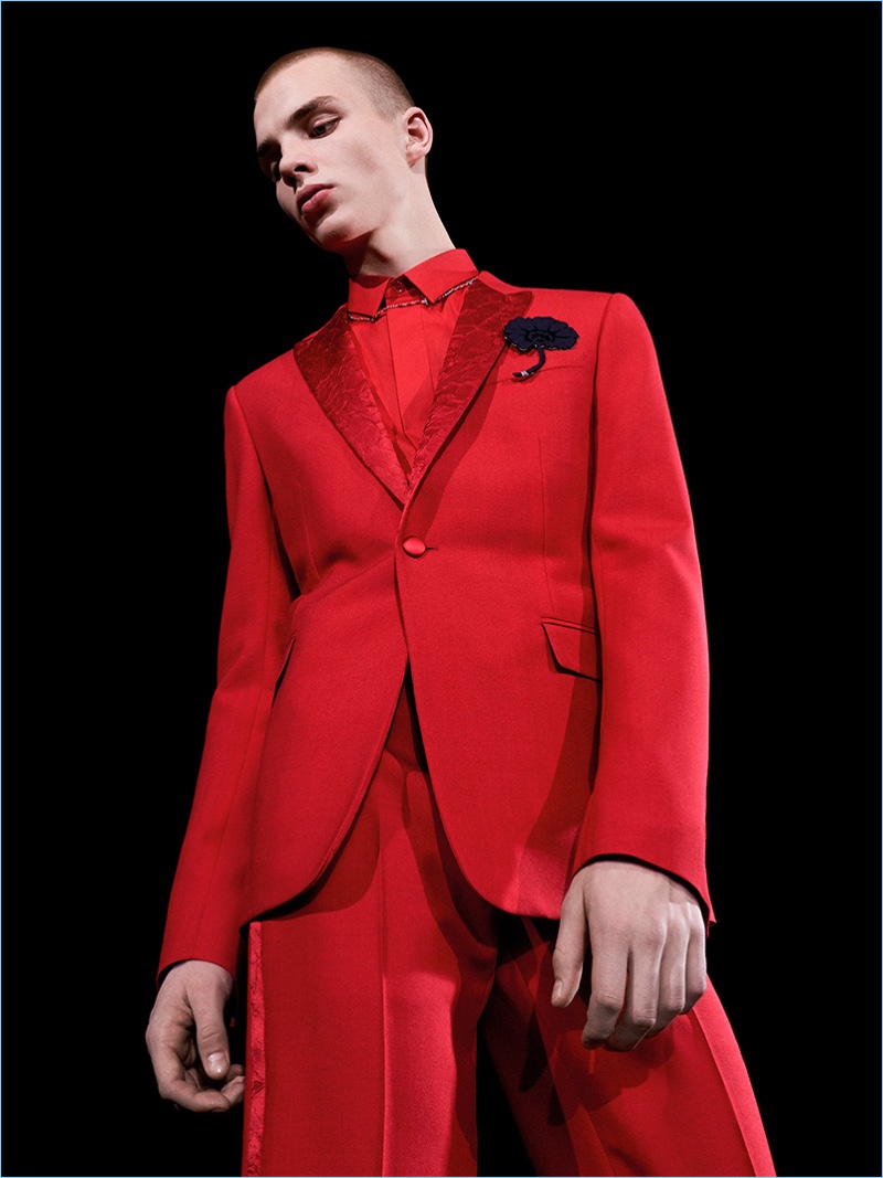A red standout, trim suiting shines for Dior Homme's fall-winter 2017 collection.