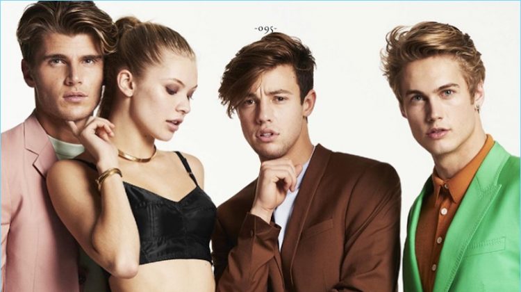 Left to Right: Twan Kuyper wears a Maison Margiela suit and Topman sweater. Josie Canseco models a Dolce & Gabbana bralette with Christian Siriano trousers. Cameron Dallas sports a brown suit by The Kooples with a Lanvin shirt. Neels Visser sports a green Paul Smith suit with a Caruso shirt.