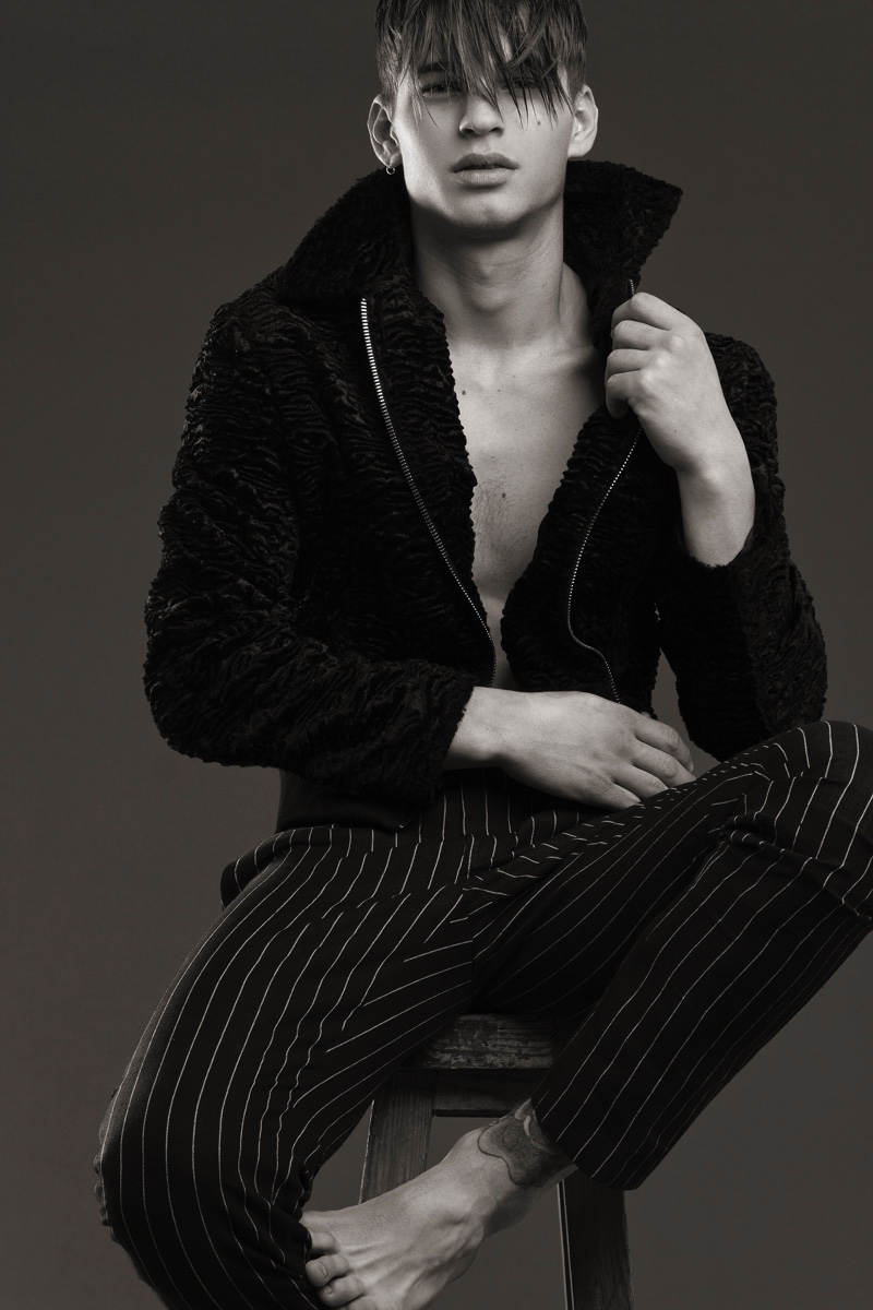 Alex wears jacket and pinstripe trousers Dimitris Petrou.