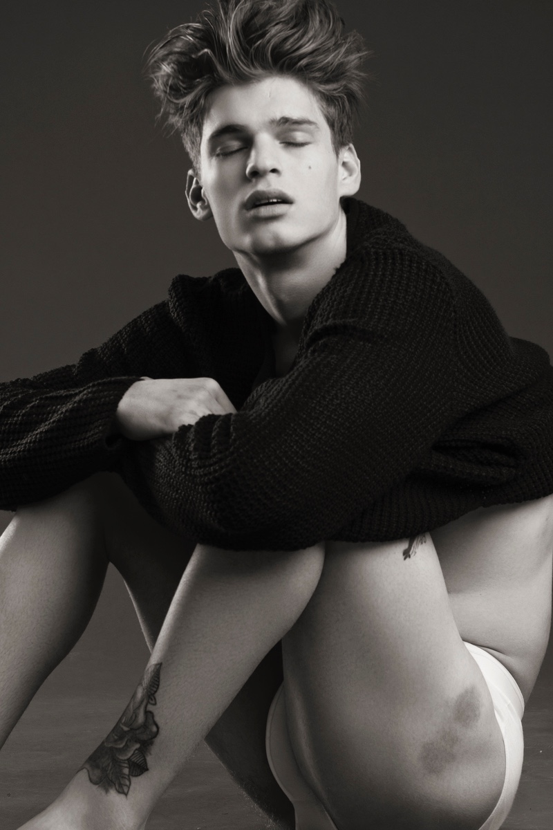 Alex wears sweater Calvin Klein and underwear Acne Studios.