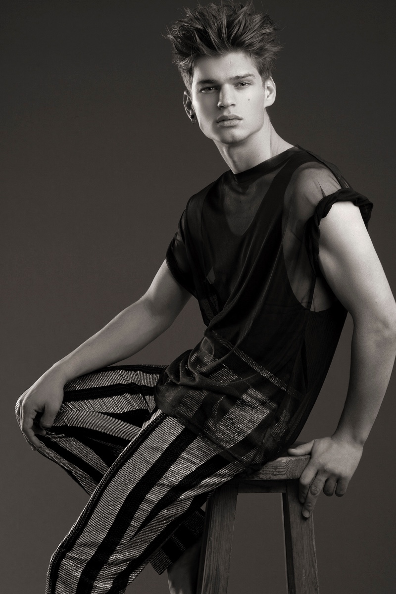 Alex wears tank Acne Studios, mesh top H&M Studio, and trousers Dimitris Petrou.