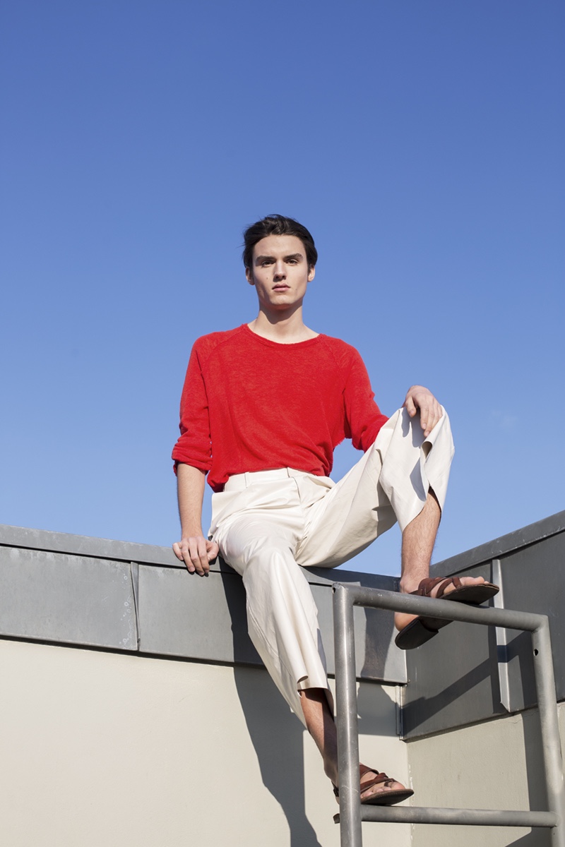 Elvis wears red top Gudrun & gudrun, trousers Fomme, and sandals Alfonso Laudato Firenze.