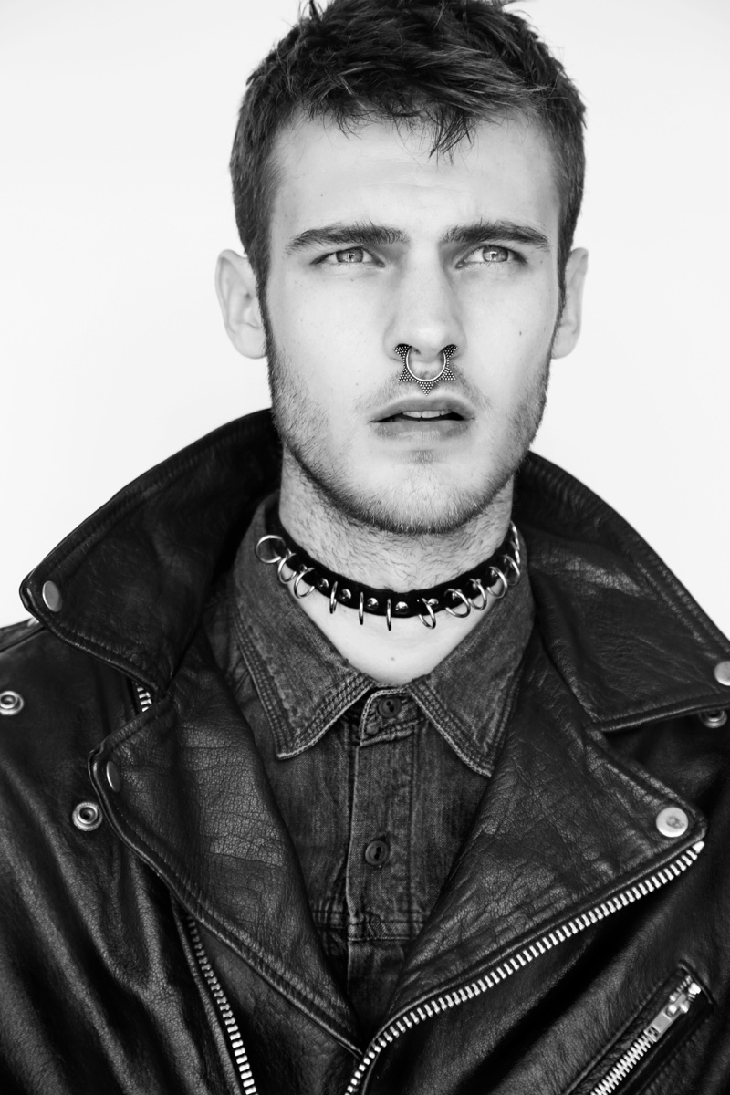 Max wears denim shirt Diesel and vintage leather biker jacket.