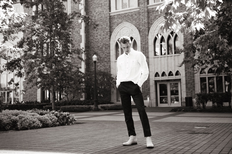 Noah wears shirt Lucky Brand, pants J.Crew, and Chelsea boots Aldo.