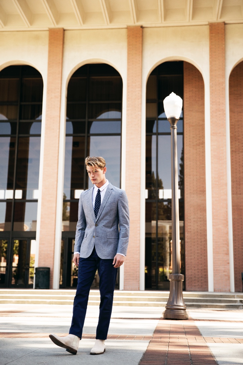 Noah wears shirt Lucky Brand, Chelsea boots Aldo, blazer, pants, and tie J.Crew.