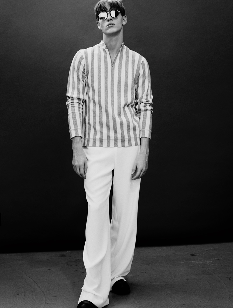 Oskar wears glasses Dior, striped shirt Libertine Libertine, pants Zara, and boots Filippa K.