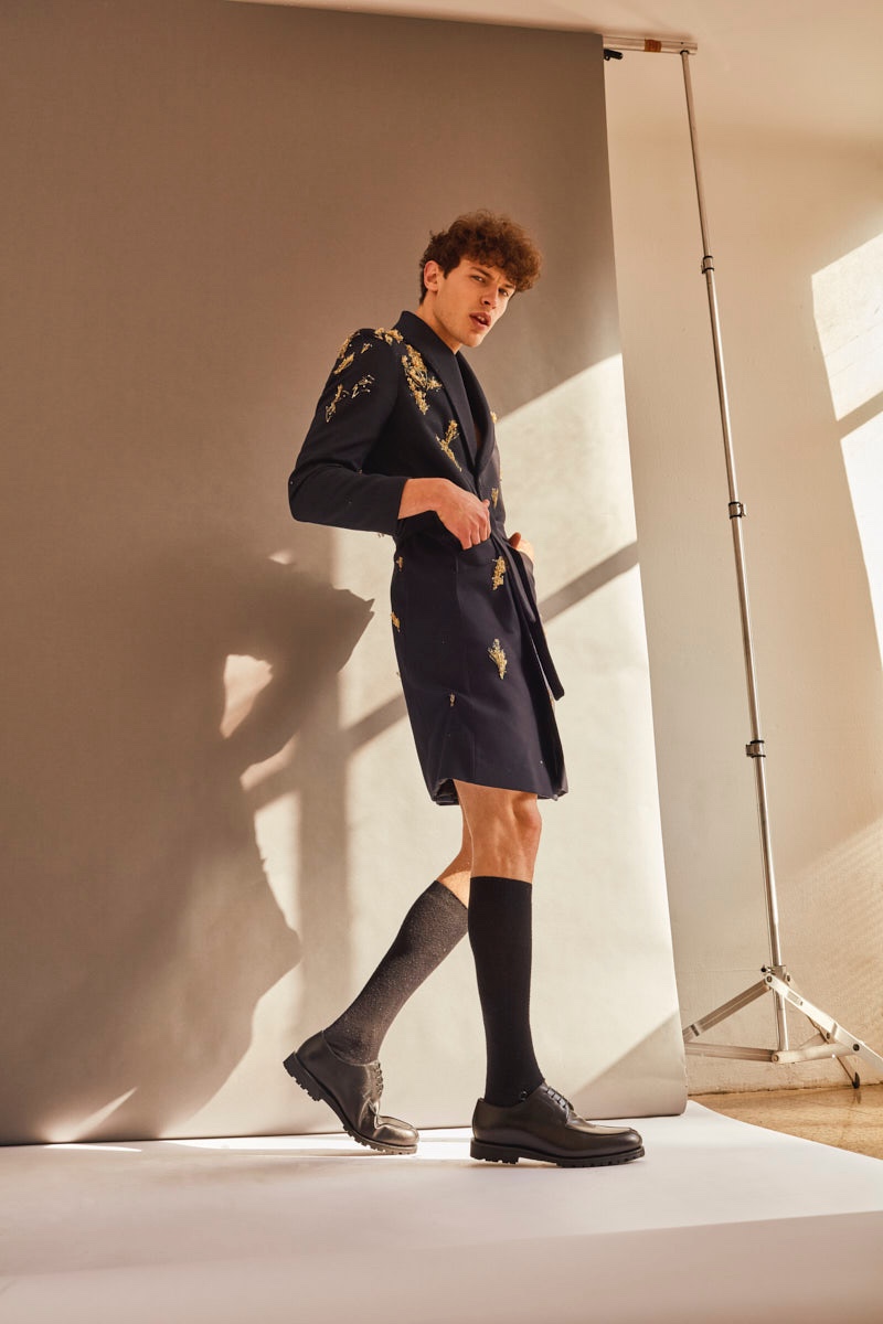 Petar wears coat Raúl Rodríguez Menswear, socks Calzedonia, and shoes Berwick for Margall.