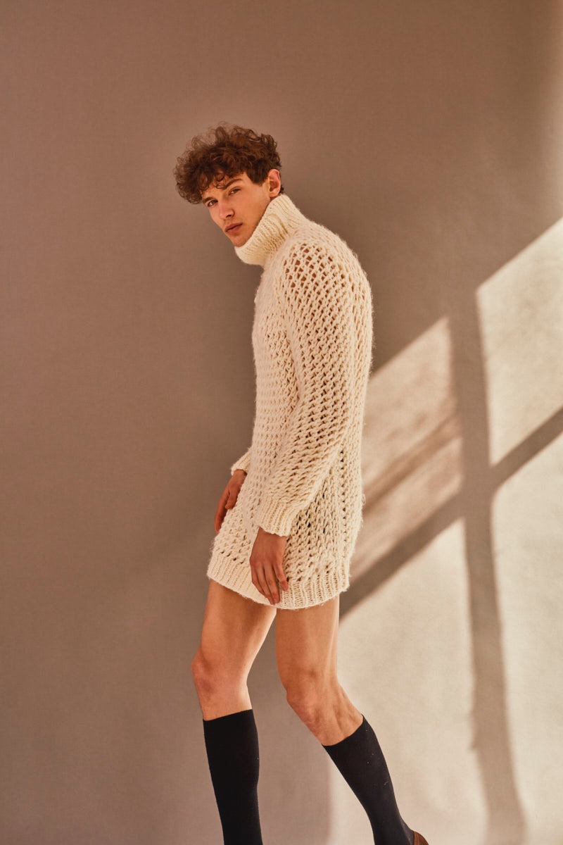 Petar wears turtleneck sweater Raúl Rodríguez Menswear and socks Calzedonia.