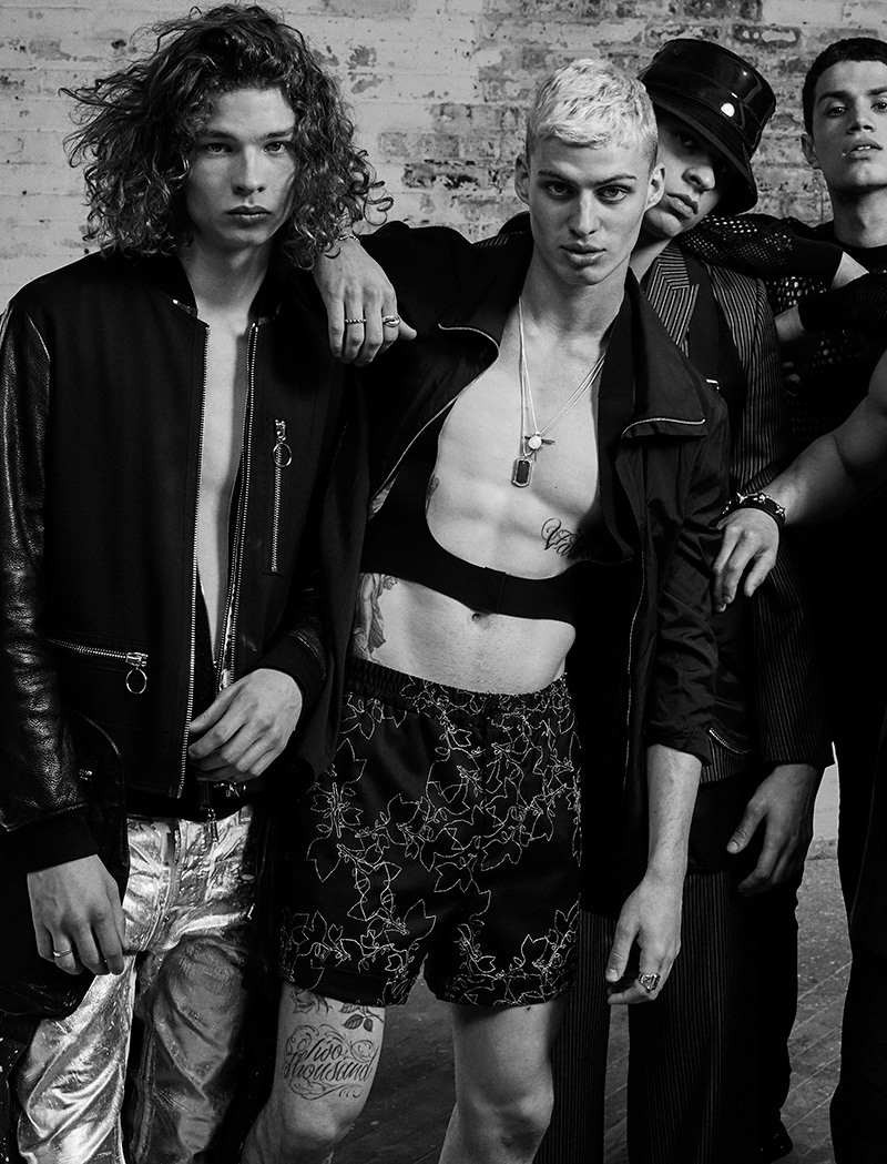 Make a dark play in black with rebellious details. Left to Right: Jack wears all clothes Dsquared2. Roman wears all clothes Emporio Armani. Elvis wears all clothes Givenchy by Riccardo Tisci. Ashton wears all clothes Dior Homme.