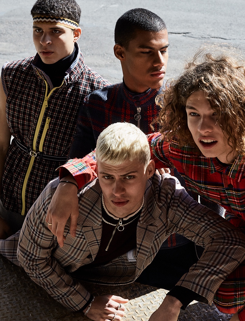 Plaid makes a comeback with easy designer must-haves. Left to Right: Elvis wears all clothes Prada. Roman wears all clothes AMI. Vitor wears all clothes Louis Vuitton. Jack wears all clothes Off-White.