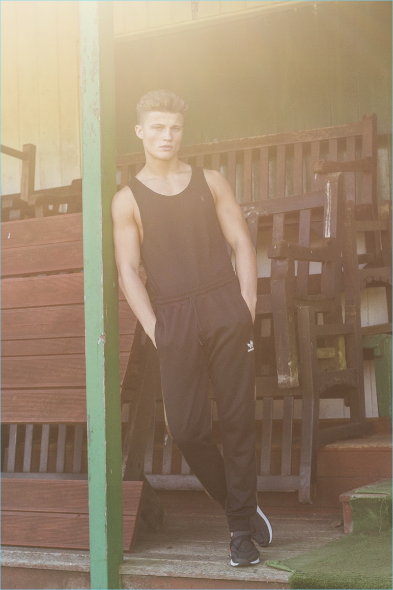 Zach wears tank AllSaints, tracksuit pants Adidas Originals, and sneakers Zara. » Exclusive: Zach Hartman by Cesar Perin Zach wears tank AllSaints, tracksuit pants Adidas Originals, and sneakers Zara.