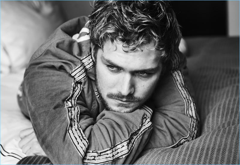 Stealing a quiet moment, Finn Jones wears a jacket and pants by Gucci. » Finn Jones Poses for Interview, Dishes on 'Iron Fist' Stealing a quiet moment, Finn Jones wears a jacket and pants by Gucci.