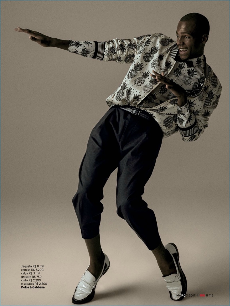 Busting a move, Ed Saldanha wears a jazz-inspired look from Dolce & Gabbana.