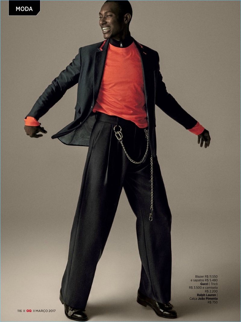 Model Henrique Alves dons a Gucci blazer and shoes with a Ralph Lauren shirt.