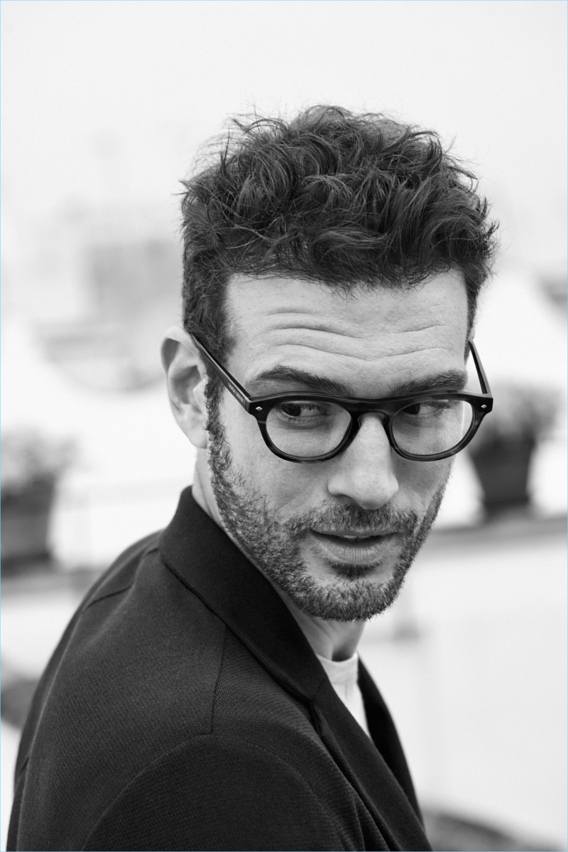 Donning a classic style, Tristan wears Giorgio Armani's AR 7132 tortoiseshell framed glasses.