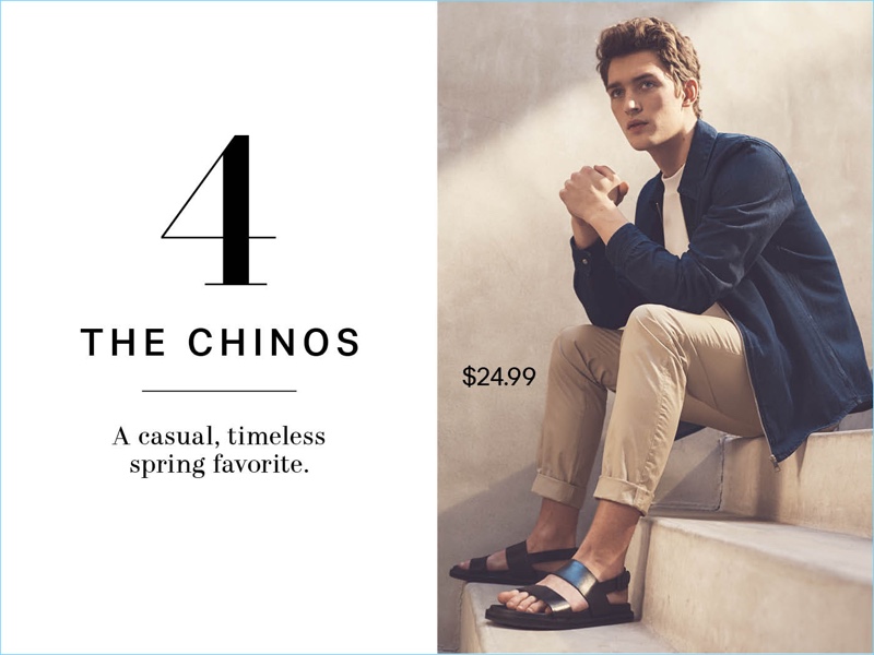 Relaxing, Otto Lotz wears a H&M denim shirt jacket $34.99, cotton t-shirt $14.99, slim-fit cotton chinos $24.99, and leather sandals $49.99.