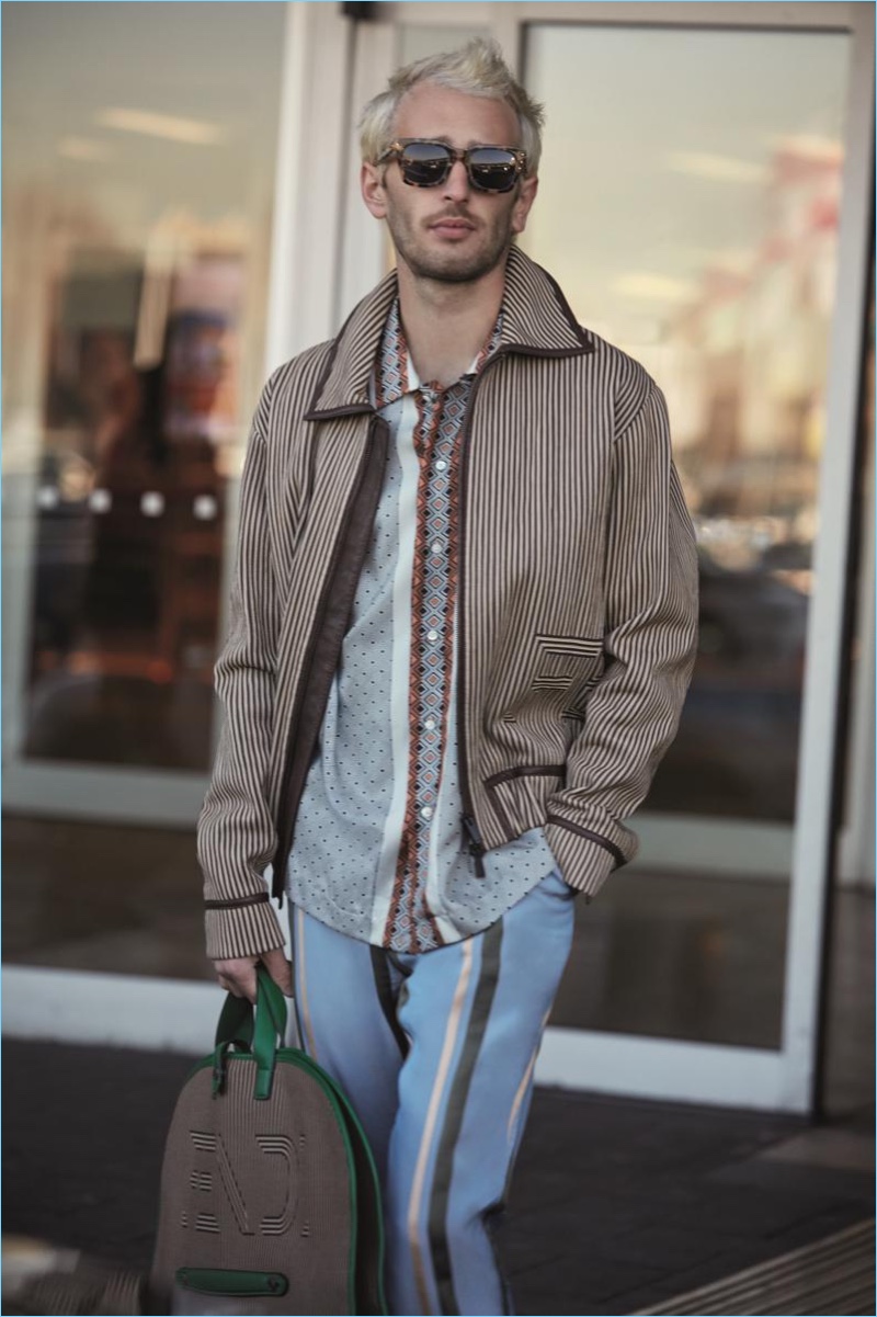 Hopper Penn departs the airport in a look from Fendi. The actor wears Fendi Sun Fun Havana Asian fit sunglasses $325.