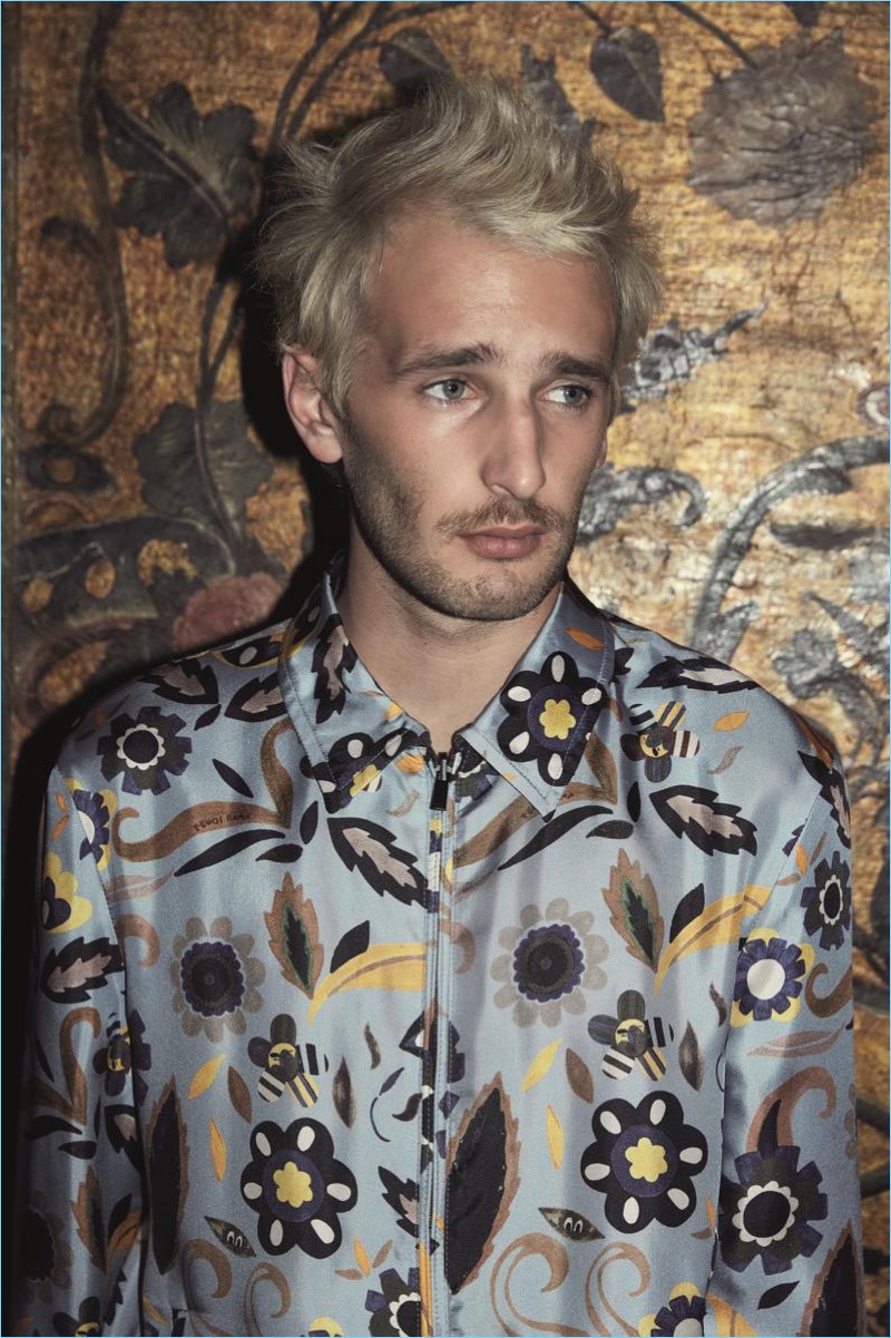 Enjoying a graphic print moment, Hopper Penn wears a Fendi printed light blue silk jacket $2,200.