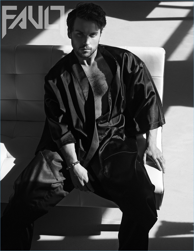 Actor Jack Falahee lounges in a silk robe for a Fault magazine photo shoot.