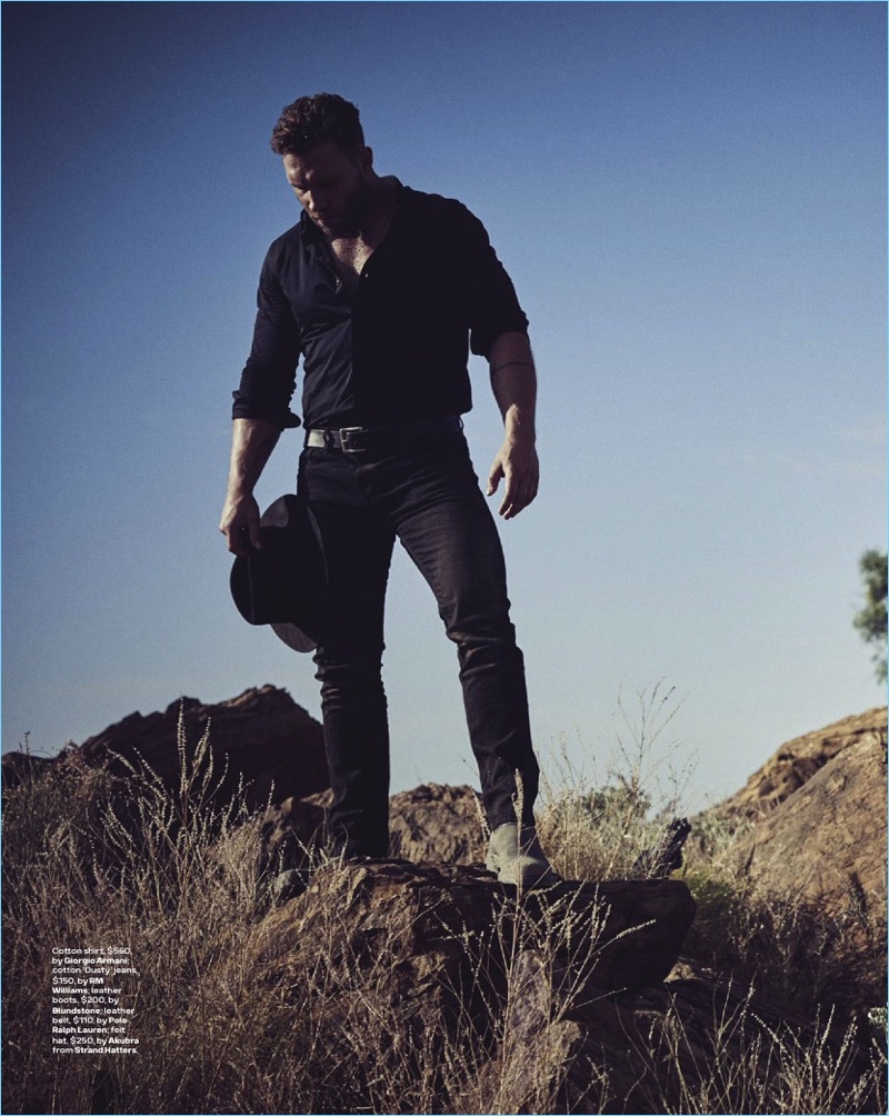 Matthew Brookes photographs Jai Courtney in a Giorgio Armani shirt with RM Williams denim jeans, and Blundstone leather boots. Courtney also sports a POLO Ralph Lauren belt and Strand Hatters hat.