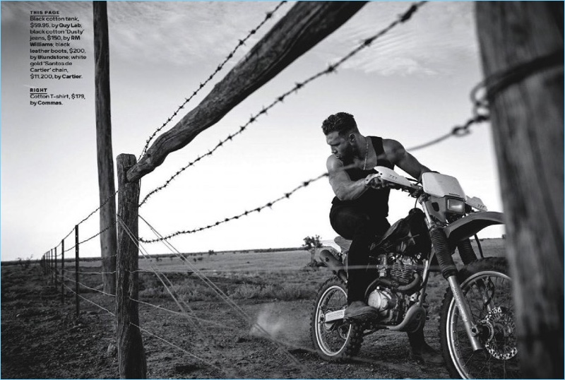 Riding a dirt bike, Jai Courtney wears a Guy Lab tank, RM Williams denim jeans, Blundstone leather boots, and a Cartier chain necklace.