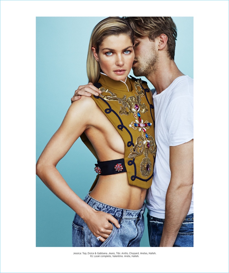 Posing for a photo with Jessica Hart, RJ King wears Valentino.