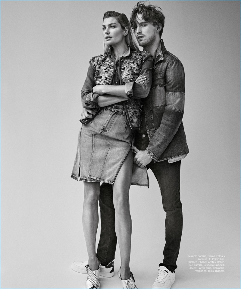 Appearing in a black and white photo with Jessica Hart, RJ King wears a Brunello Cucinelli shirt with Calvin Klein jeans, a Valentino denim jacket, and Diadora sneakers.