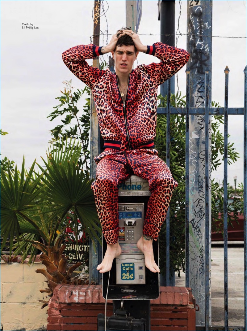 Wearing a leopard print tracksuit by 3.1 Phillip Lim, Josh Beech enjoys a moment on the wild side.