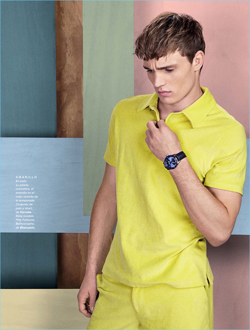 Model Julian Schneyder sports a polo and shorts by Hermes.