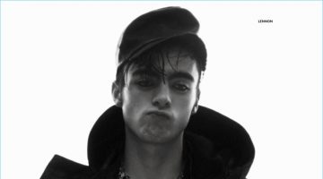 Liam Gallagher's Son Lennon Stars in Vogue Hommes Paris Editorial Pouring on the charm, Lennon Gallagher wears a Givenchy jacket and zippered top with a vintage leather cap from Costume Studio.