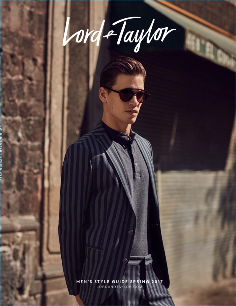 Covering Lord & Taylor's spring 2017 men's catalogue, Mark Cox dons a Selected Homme striped suit jacket $255 and pants $150 with a navy polo by Selected Homme.