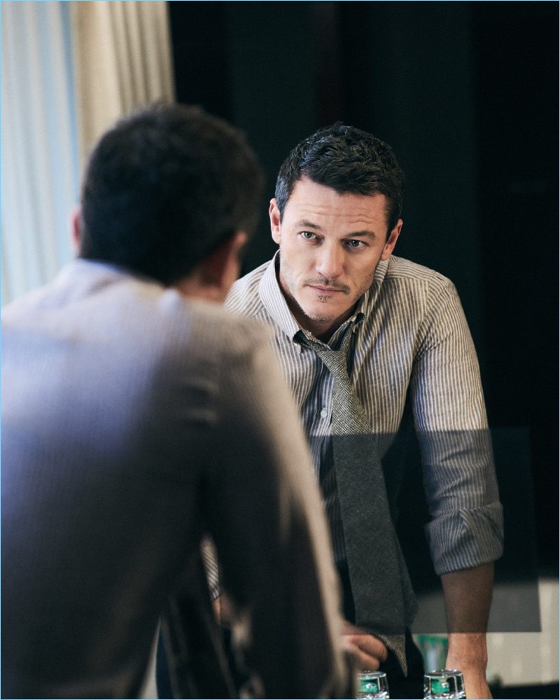 Luke Evans wears a striped Brunello Cucinelli linen shirt with Rubinacci trousers and a Thom Sweeney tie.