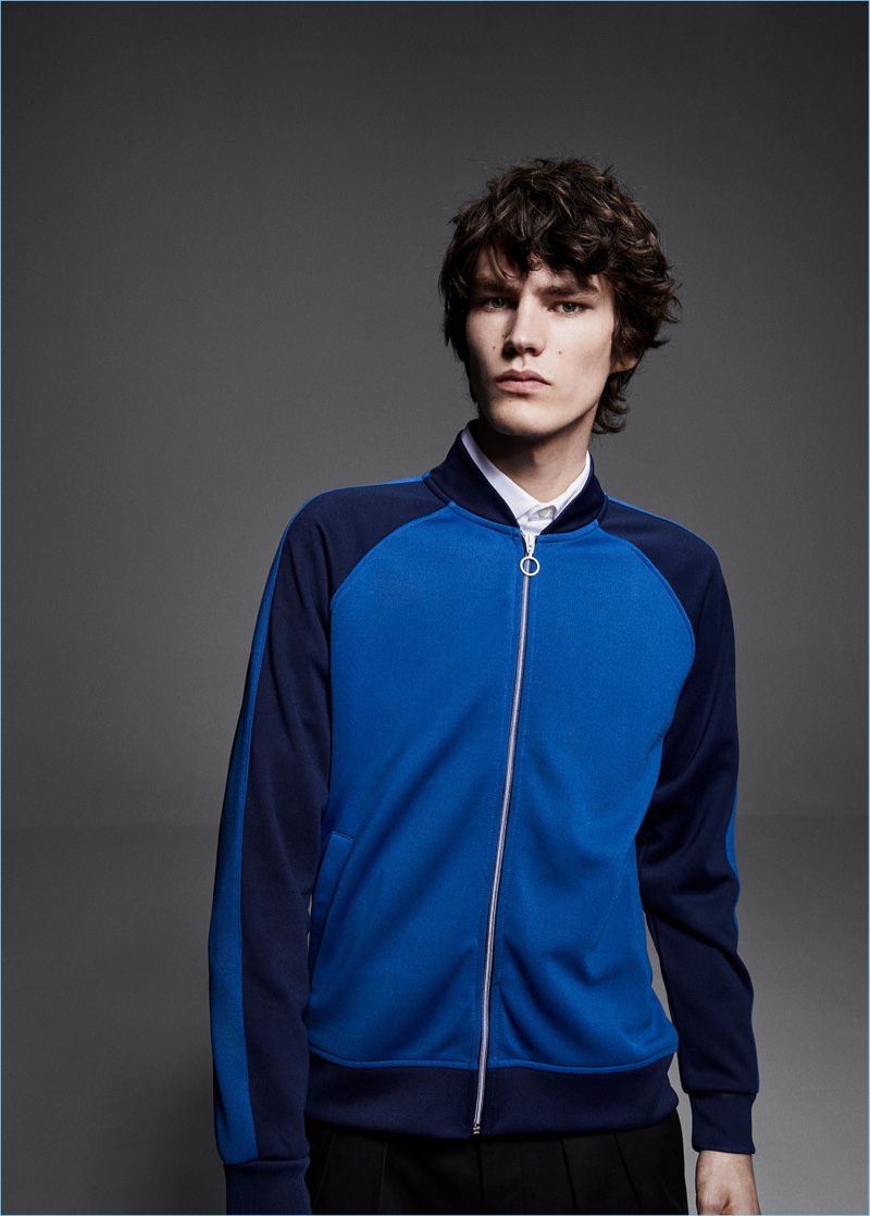 Going sporty, Elias de Poot wears a Mango Man track jacket $69.99 with a slim-fit cotton shirt $35.99.