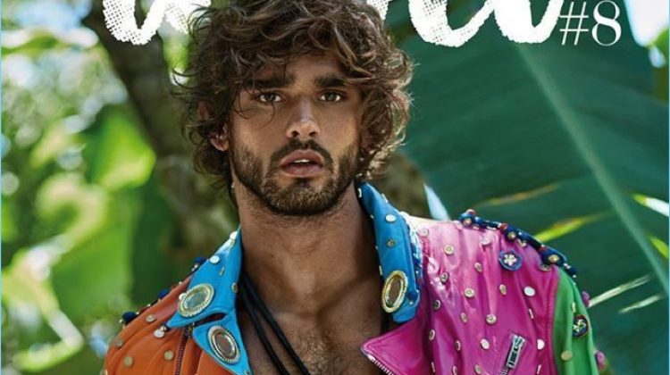 Marlon Teixeira covers Risbel magazine in a Moschino multi-colored leather biker jacket.