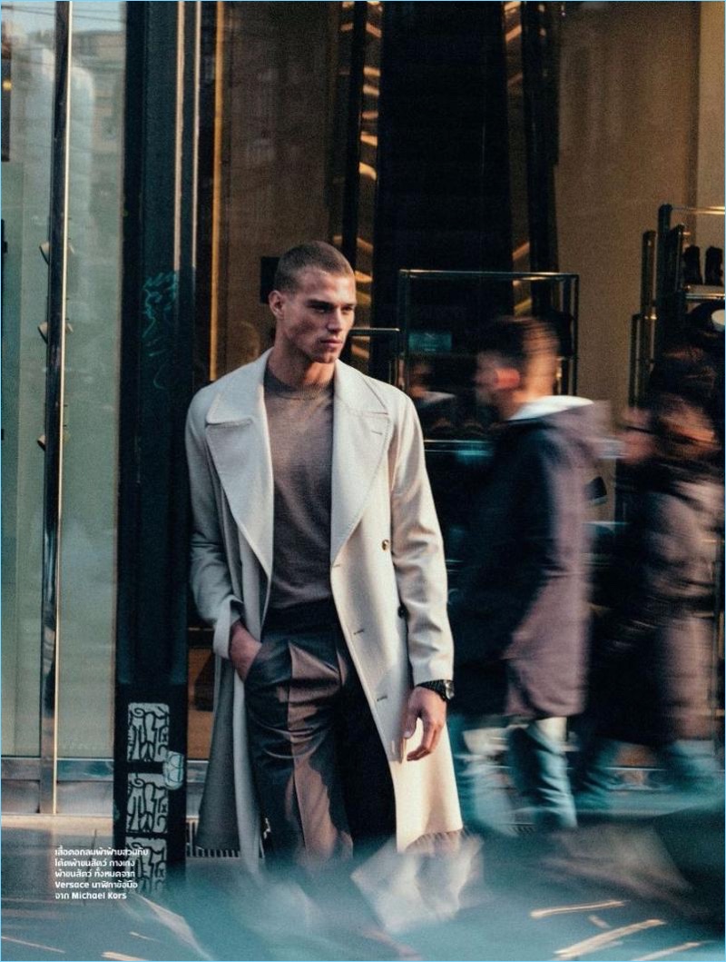 Venturing outdoors, Matthew Noszka wears Versace and Michael Kors.