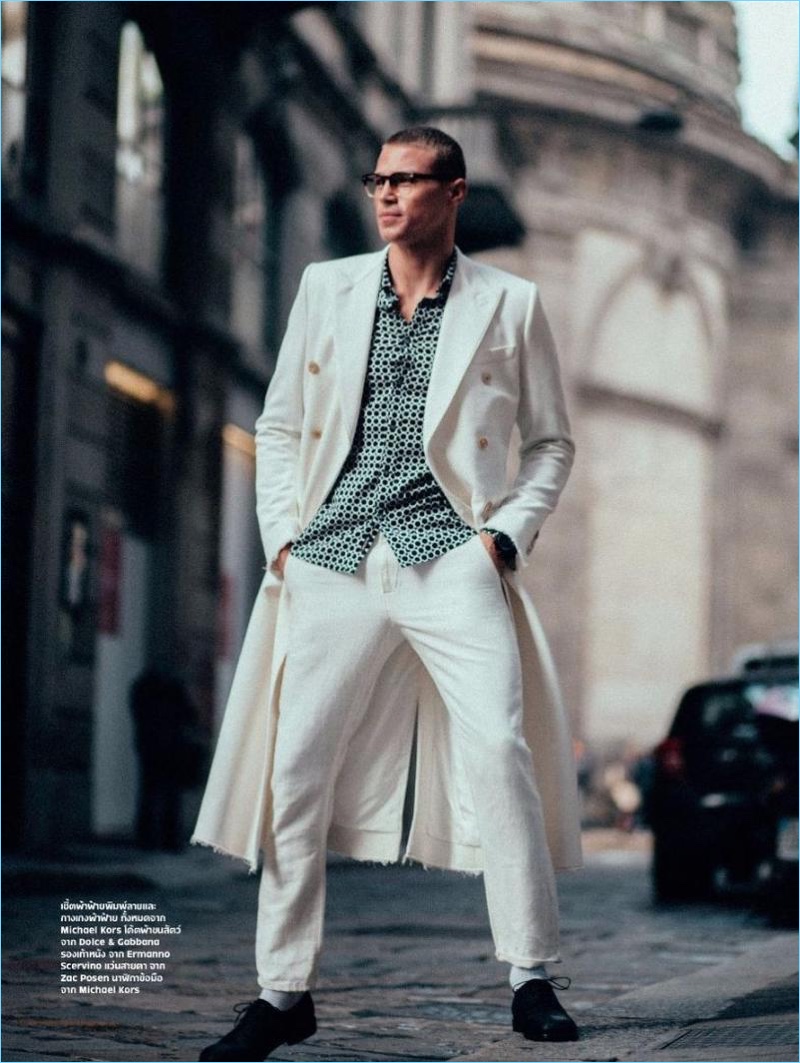 Sporting a dapper white look, Matthew Noszka dons brands such as Michael Kors, Dolce & Gabbana, and Ermanno Scervino.