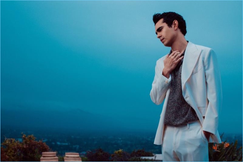 Max Minghella dons a Dolce & Gabbana suit with a Canali polo shirt.