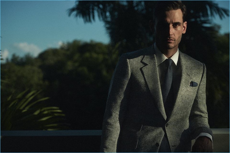 Kingsman delivers an elegant moment with its slim-fit herringbone blazer $1,595, Kingsman + Turnbull & Asser oxford shirt $350, Drake’s 8cm silk-grenadine tie $155 and silk pocket square $65.